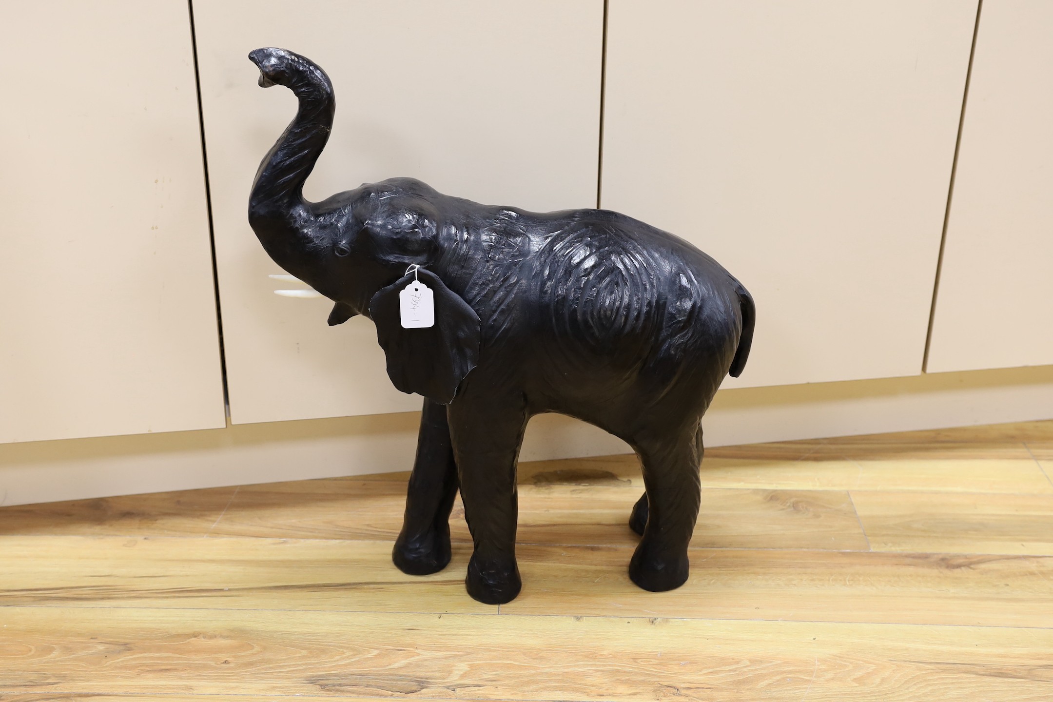 A Liberty style large leather model of an elephant, 68cm